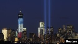 The "Tribute in Light" is illuminated during events marking the 11th anniversary of the 9/11 attacks on the World Trade Center in New York.