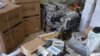 IRAN -- A photo provided by the Police News Agency, shows boxes of machinery used in Bitcoin "mining" operations that were confiscated by police in Nazarabad, undated