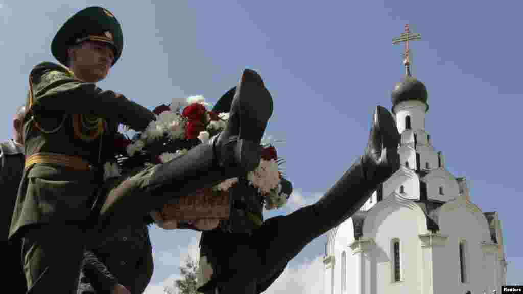 Belarusian guards of honor march with a wreath during a memorial ceremony for Chornobyl victims in Minsk on April 26. (Reuters/Vasily Fedosenko)