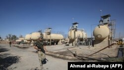 Iraqi federal forces enter the Bai Hassan oil field, west of the multi-ethnic northern city of Kirkuk, October 17, 2017