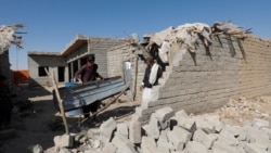 دا د کوټې په سره غړګۍ سیمه کې هغه کور دی چې د ځايي خلکو په وینا په ډرون برید لګېدلی دی. 