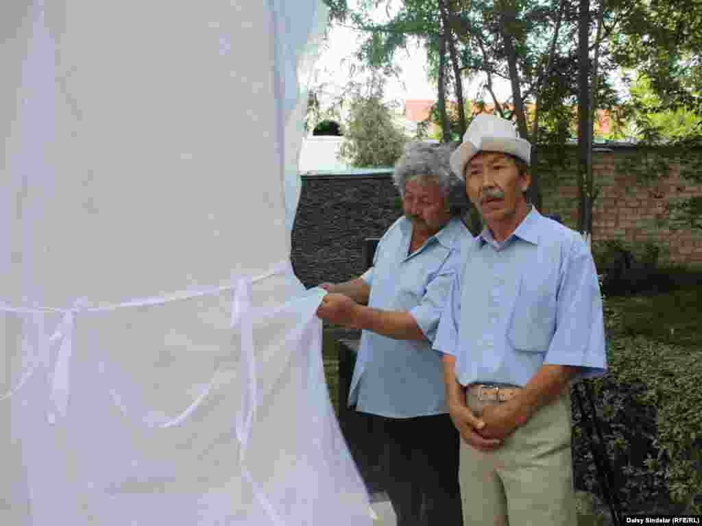 Altynbek Torogeldiev, whose sculpture honoring the victims of the June 2010 clashes was unveiled at a June 10, 2011, ceremony marking the one-year anniversary of the start of the violence. The sculpture, made of cast stone, depicts Uzbek and Kyrgyz mothers embracing each other and weeping. Photo by RFE/RL's Daisy Sindelar