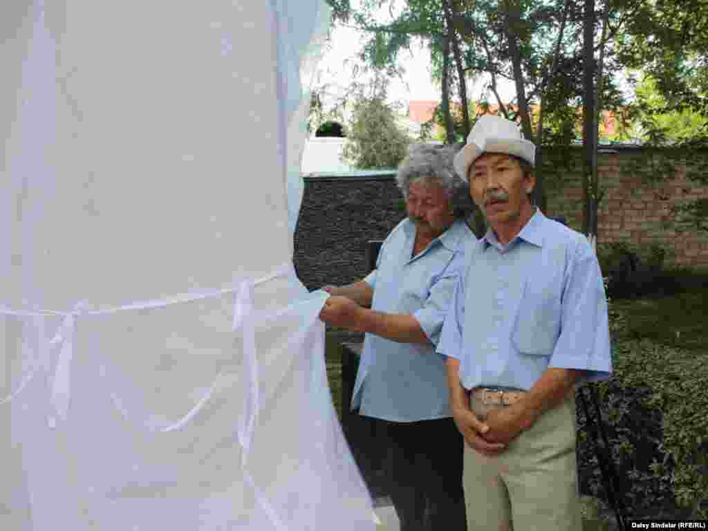 Altynbek Torogeldiev, whose sculpture honoring the victims of the June 2010 clashes was unveiled at a June 10, 2011, ceremony marking the one-year anniversary of the start of the violence. The sculpture, made of cast stone, depicts Uzbek and Kyrgyz mothers embracing each other and weeping. Photo by RFE/RL's Daisy Sindelar 