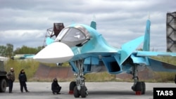 A new-generation Su-34 bomber is revealed at the Novosibirsk Aviation Plant in June.