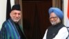 Indian Prime Minister Manmohan Singh (right, with Afghan President Hamid Karzai in New Delhi in January) will keep his job in a neighborhood engulfed in crisis and conflict.
