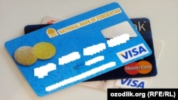 Пластиковые карточки Национального банка Узбекистана.