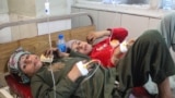 TOPSHOT - Injured Afghan children receive treatment at a hospital after an earthquake in Jalalabad, in eastern Afghanistan, on September 1, 2025.