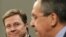 Russian Foreign Minister Sergei Lavrov, right, with his German counterpart Guido Westerwelle. New visa laws came into effect when the two met in Moscow.