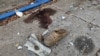 Personal items litter the site where a Russian missile hit a queue of pensioners in the village of Yarova on September 9.