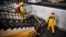 Servicemen of Russia's Emergencies Ministry disinfect a railway terminal in Moscow.