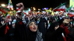 People chant at a rally in Tehran on May 6.