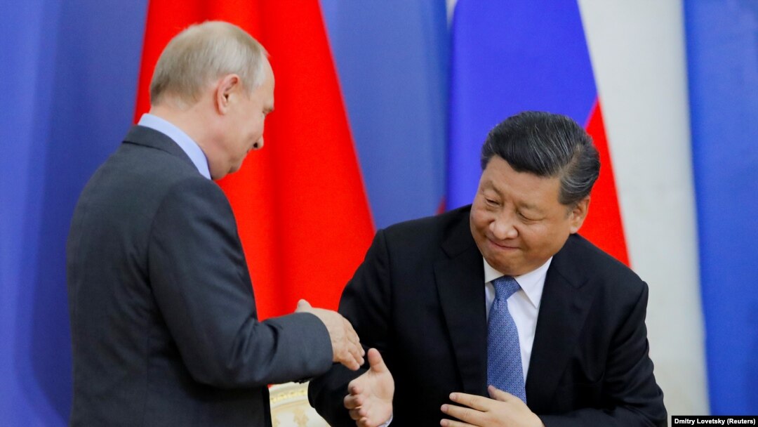 Președintele rus Vladimir Putin și președintele chinez Xi Jinping 