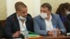 Иван Ангелов (с маската) по време на изслушването в парламента