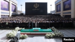 Iranian officials attend a funeral prayer for late Supreme Leader Ayatollah Ali Khamenei in Tehran on July 5. 