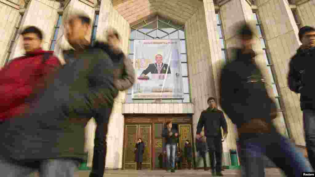 Students walk out of the Central National Museum in Almaty.