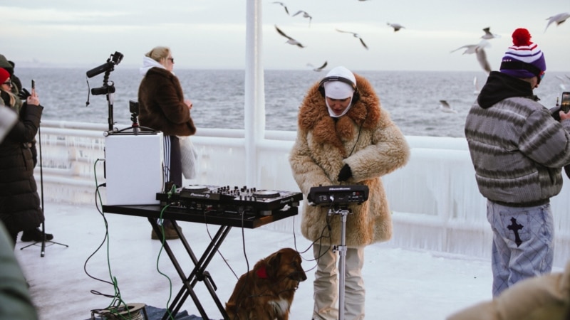 Odesa Residents Dance To Warm Up As DJ Plays During Air Raid Warnings