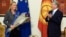 EU foreign policy chief Federica Mogherini (left) meets outgoing Kyrgyz President Almazbek Atambaev in Bishkek on November 9.