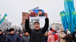 Участник митинга, требующий освободить этнических казахов из Китая Кастера Мусаханулы и Мурагера Алимулы. Алматы, 16 декабря 2019 года.