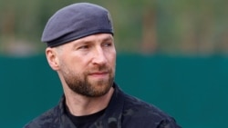 UKRAINE-CRISIS/REBURIAL-OFFICIALS