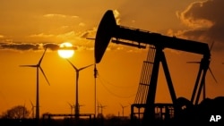 A pumpjack of Wintershall DEA extracts crude oil at an old oil field in Emlichheim, Germany.