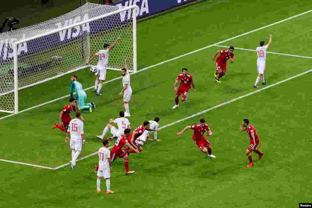 Soccer Football - World Cup - Group B - Iran vs Spain - Kazan Arena, Kazan, Russia - June 20, 2018 Iran's Saeid Ezatolahi celebrates scoring a goal that is later disallowed following a VAR review REUTERS/John Sibley