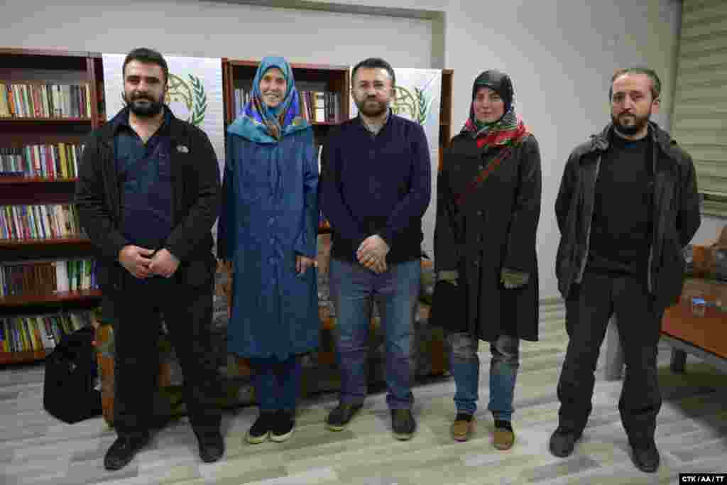 Two Czech women -- Antonie Chrastecka (second from left) and Hana Humpalova (second from right) -- kidnapped in March 2013 by armed groups linked to Al-Qaeda in Pakistan are seen in Turkey after being released on March 27. They are now back home in the Czech Republic.