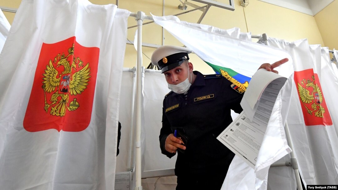 A naval cadet leaves a voting booth in Vladivostok on September 17.
