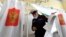 A naval cadet leaves a voting booth in Vladivostok on September 17.