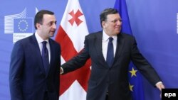 European Commission President Jose Manuel Barroso (right) welcomes Georgian Prime Minister Irakli Garibashvili at the EU Council headquarters in Brussels on May 21.