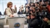 Moldova's President Maia Sandu casts her vote in Chisinau on October 20. "Criminal groups working with foreign forces have attacked our country with tens of millions of euros, lies, and propaganda...to keep our country trapped in uncertainty and instability," she said.