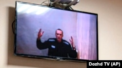 Russian opposition leader Aleksei Navalny speaks during a video link from prison during a court session in Petushki on May 31.