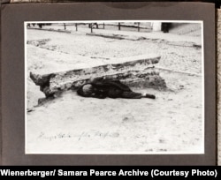 Taken in central Kharkiv by Wienerberger in 1933, his caption for this photo describes the subject as "the body of a famine victim on the street."