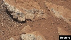 Когда-то над этими марсианскими камнями текла вода. 