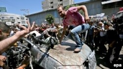 Знищене авто підозрюваних бойовиків у Смузі Гази, 8 липня 2014 року
