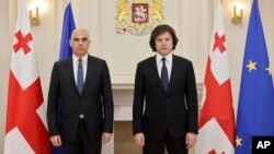 ალენ ბერსე (მარცხნივ) და ირაკლი კობახიძე