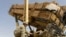 A US Army air defense artilleryman conducts maintenance on an MIM-104 Patriot missile system at an undisclosed location in the Middle East.