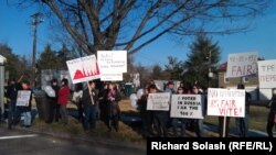 Demonstrators protest against the recent parliamentary elections outside the Russian Embassy in Washington, D.C., on December 24.