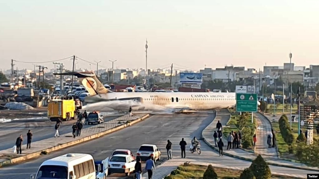 The plane made a hard landing and skidded onto a nearby highway.