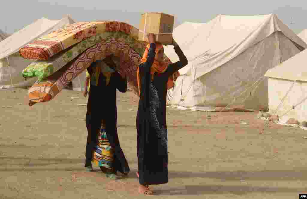 Displaced Iraqis from the embattled city of Fallujah take shelter in a camp on the southern outskirts of the city in Amiriyiah al-Fallujah earlier this week. (AFP/Moadh al-Dulaimi)