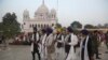 FILE: The Indian Sikhs visited the Pakistani town of Kartarpur, home to a temple that marks the site where the founder of Sikhism, Guru Nanak, died.