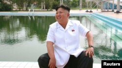 Ким Чен Ын во время визита в пионерский лагерь. Дата съемки неизвестна