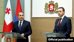 Georgia - Prime Minister Irakli Gharibashvili (R) and his Armenian counterpart Hovik Abrahamian at a news conference in Tbilisi, 11Dec2014.