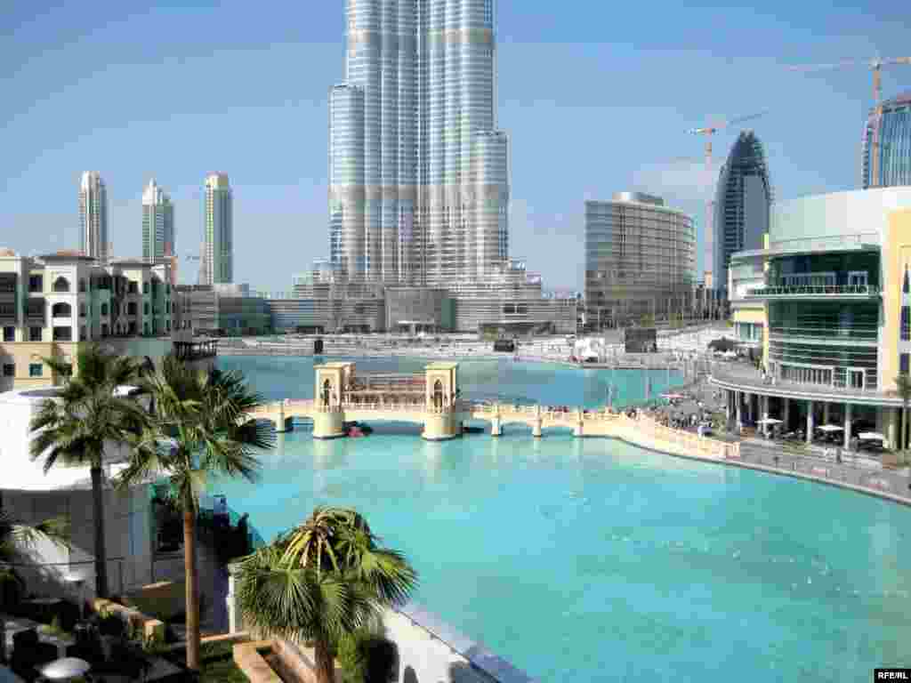 The Arab Emirate of Dubai is famous for its wealth, tourism, and booming growth. Here, the base of the recently completed Burj Khalifa -- the world's tallest building -- is seen behind a luxury resort, surrounded by construction sites. Photos by Abbas Atilay of RFE/RL's Azerbaijani Service