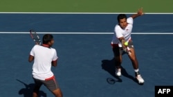 The doubles team of Rohan Bopanna (left) of India (left) and Aisam Ul-Haq Qureshi of Pakistan in their successful semifinal match at the U.S. Open tennis tournament in New York on September 8