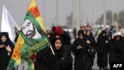 Shi'ite pilgrims leave Baghdad for the holy city of Karbala on February 1, when a female suicide bomber killed more than 40 and wounded over 100 other pilgrims.