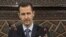 Сирия президенти Башар ал-Ассад парламентте сүйлөп жатат, 30-март.