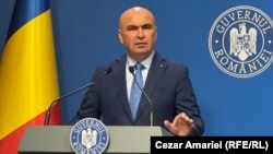 Premierul Ilie Bolojan spune că România va plăti în 2025 11 miloarde de euro dobânzi.