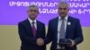 Armenia - President Serzh Sarkisian (L) awards a state medal to Russian-Armenian businessman Samvel Karapetian, Yerevan, 26Sep2015.