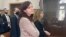 Kira Yarmysh attends a court hearing in Moscow 0n March 18.