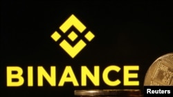 Лягатып кампаніі Binance. Ілюстрацыйнае фота 